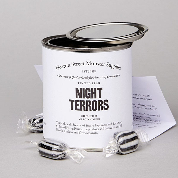 A white tin with sweets and a story called 'Night Terrors'